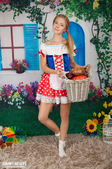 Blonde Cosplay Model Strips Out of Her Costume in Socks