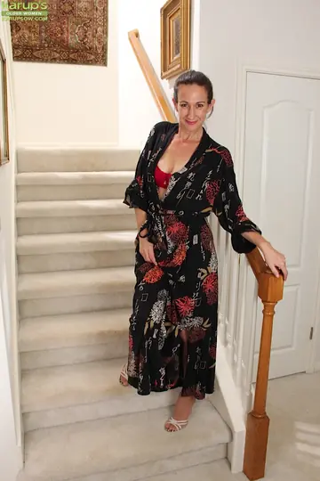 Mature European Brunette Fingers Her Pussy on the Stairs