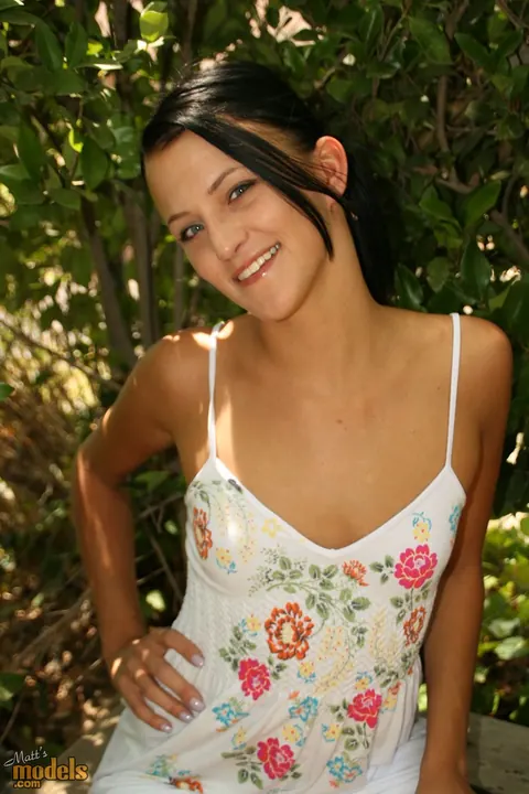 Brandy Bates: Tall Brunette MILF Strips Naked in the Garden – photo 2 of 16