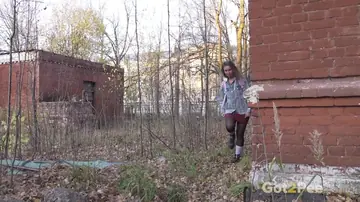 PAWG in Stockings Bares Her Ass and Pisses by an Abandoned Building