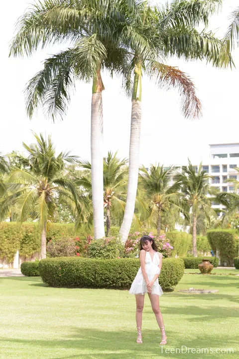Woman Strips Out of Her Dress by the Pool – photo 2 of 21