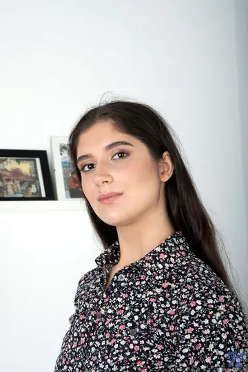 Petite Russian Brunette Pulls Her Top Down