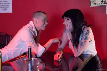 Kelly Chaos – Brunette MILF and Short-Haired Woman Kiss, Finger and Lick
