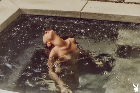 Woman Strips Out of Her Bodysuit Outdoors – photo 7 of 20