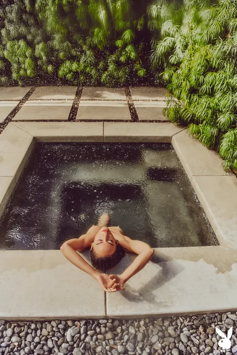 Woman Strips Out of Her Bodysuit Outdoors – photo 9 of 20