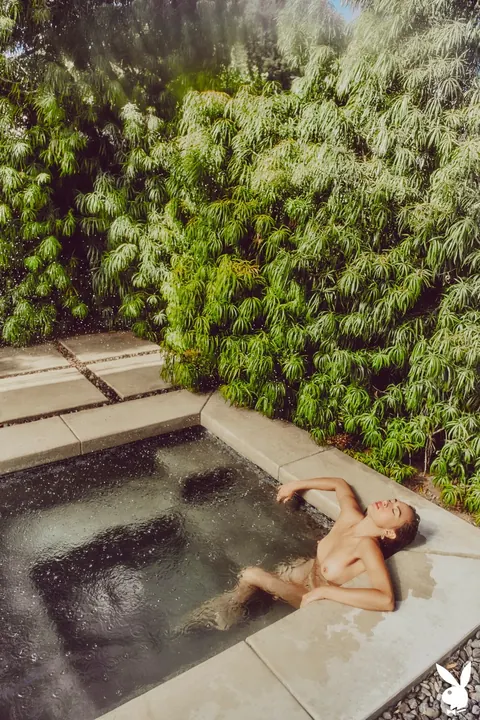 Woman Strips Out of Her Bodysuit Outdoors – photo 10 of 20