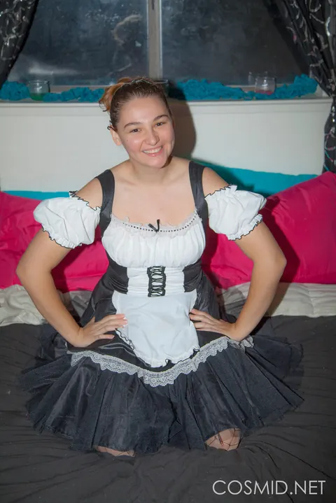 Busty Redhead Strips Off Her Costume and Kneels Naked – photo 1 of 16