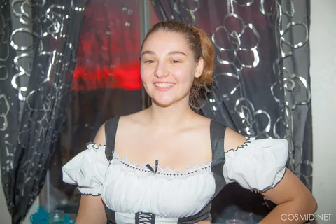 Busty Redhead Strips Off Her Costume and Kneels Naked – photo 4 of 16