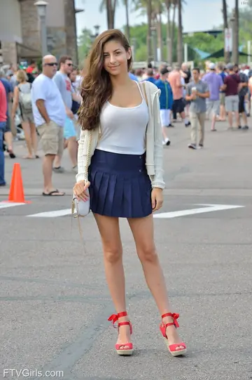 Slim Brunette Flashes Her Big Natural Tits and Panties in Public