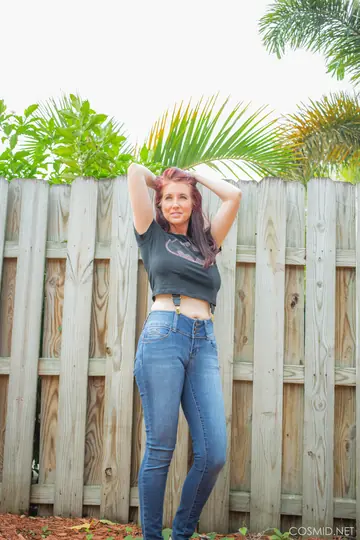 Thick Redhead MILF Strips Out of Her Jeans and Top in the Yard
