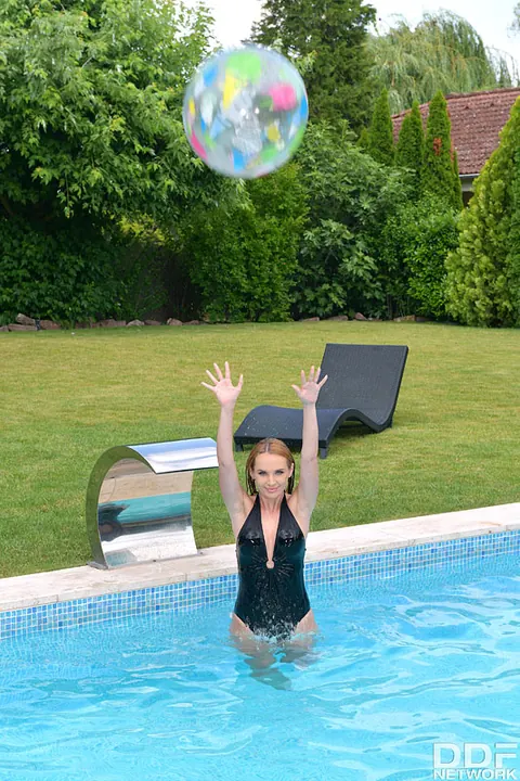 Kaisa Nord: Busty European Redhead Gives a Blowjob by the Pool – photo 4 of 12