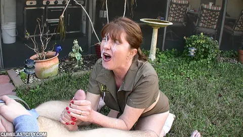 Dee Delmar: Busty Redhead MILF Jerks Her Partner Off Outdoors for a Facial – photo 2 of 16