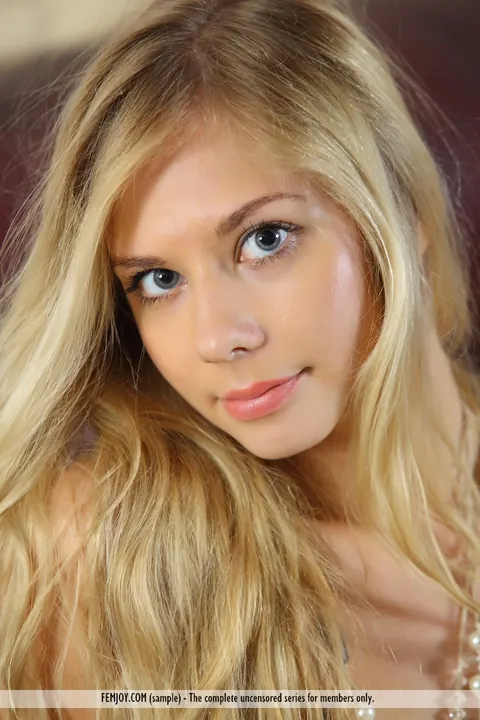 Blonde European Strips Off Her Panties and Shows Her Shaved Pussy – photo 16 of 16