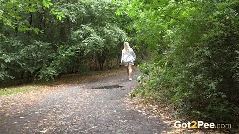 Nikky Dream: Tall European Blonde Lifts Hem and Pisses Outdoors – photo 15 of 15