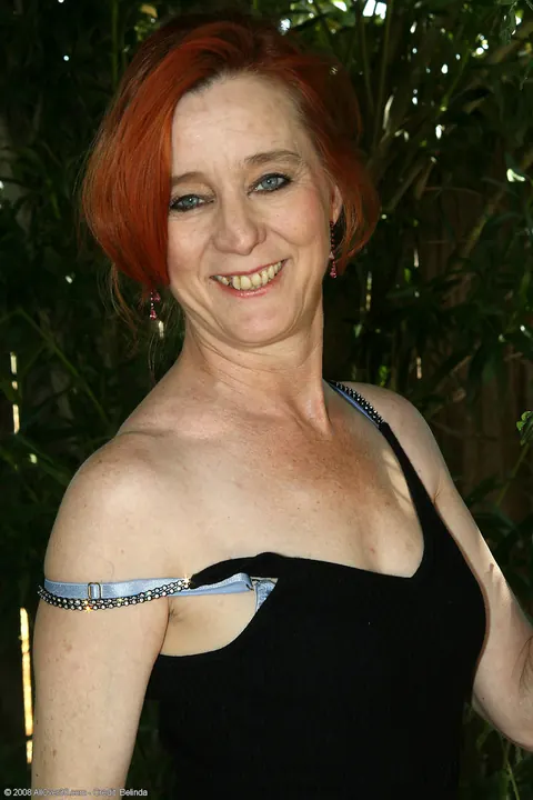 Mature Redhead Strips Out of Her Skirt Outdoors – photo 5 of 21