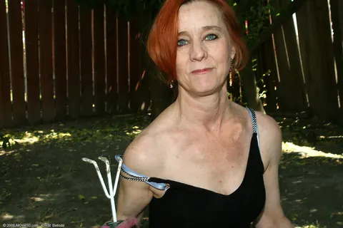 Mature Redhead Strips Out of Her Skirt Outdoors – photo 3 of 21