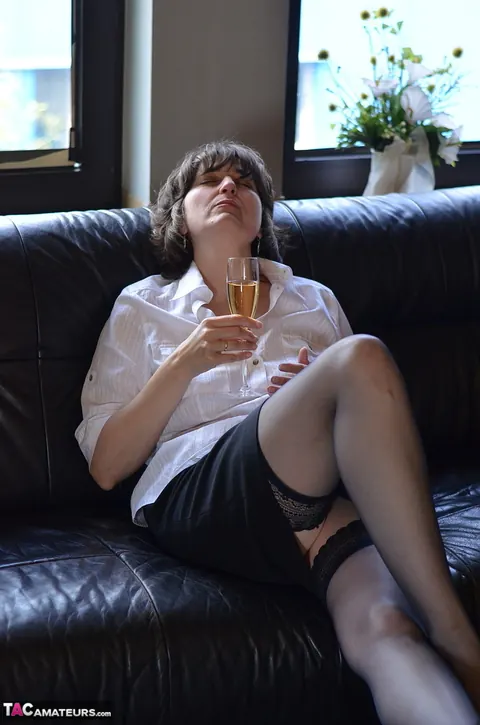 Busty Mature Brunette in a Skirt and Heels Fingers and Spreads – photo 2 of 16