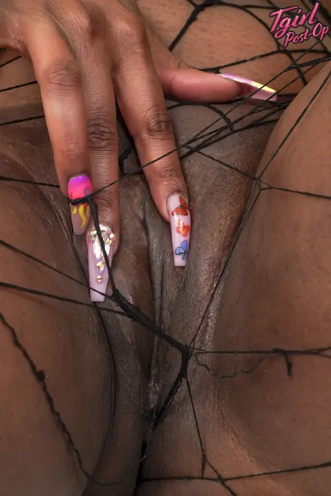 Trans Woman Shows Off Her Chest in Fishnet – photo 13 of 16
