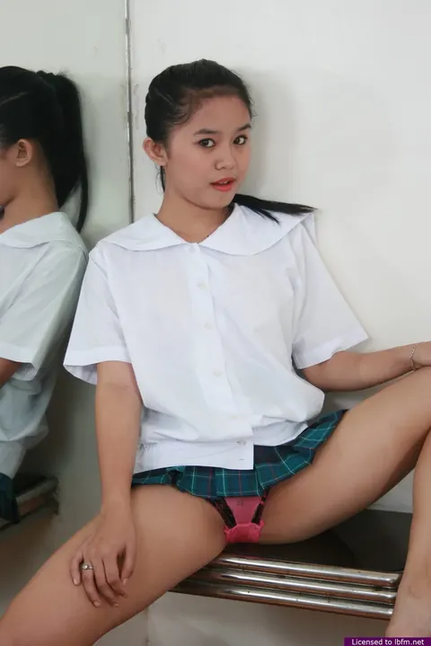 Mildred: Busty Asian Brunette Spreads Her Pussy in a Skirt – photo 2 of 12