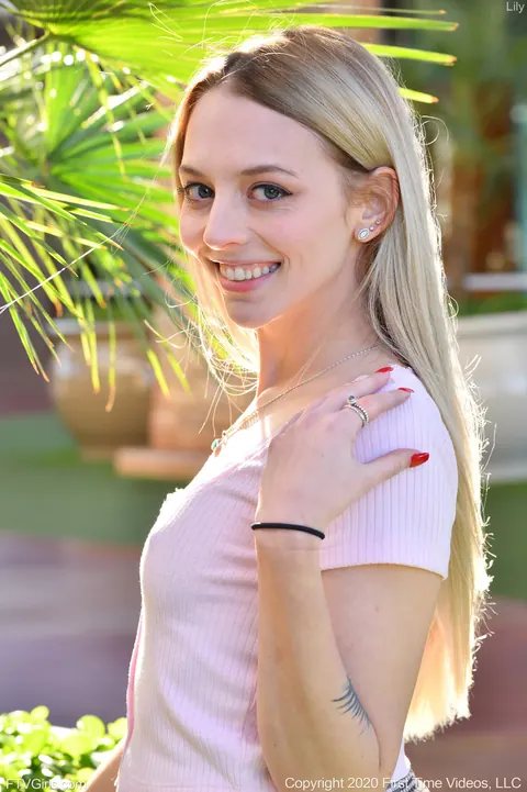 Lily Larimar: Blonde Amateur in a Skirt Masturbates on the Sofa – photo 16 of 20