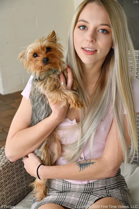 Lily Larimar: Blonde Amateur in a Skirt Masturbates on the Sofa – photo 1 of 20
