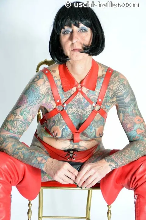 Mature Woman in Leather Lingerie Spreads in Bondage – photo 12 of 16