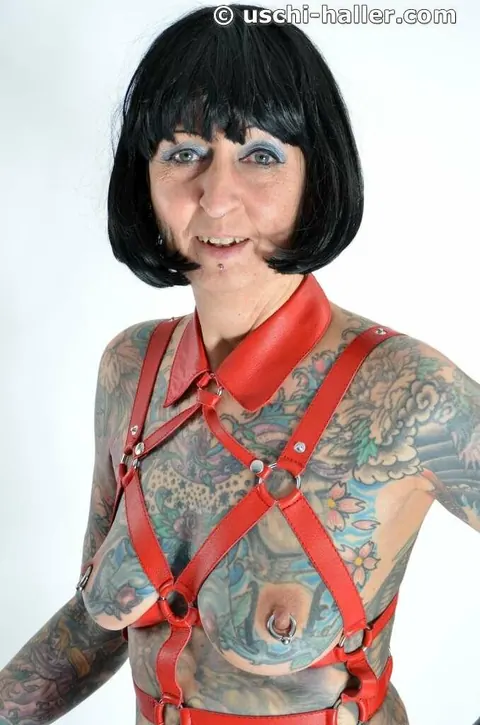 Mature Woman in Leather Lingerie Spreads in Bondage – photo 5 of 16