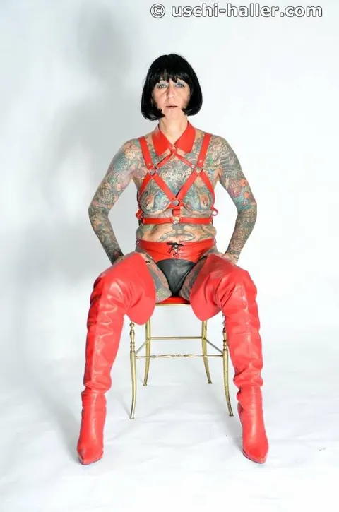 Mature Woman in Leather Lingerie Spreads in Bondage – photo 2 of 16