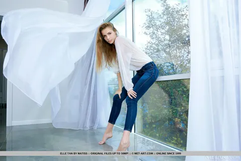 Elle Tan: Tall European Brunette Strips Out of Her Jeans by the Window – photo 2 of 18