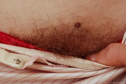 Redhead Pulls Aside Her Panties to Show Her Hairy Pussy – photo 5 of 16