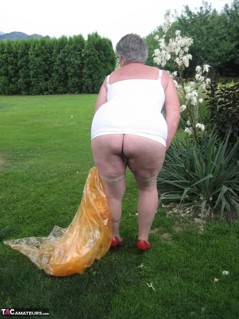 BBW in Stockings Strips Outdoors Showing Her Saggy Tits – photo 15 of 20