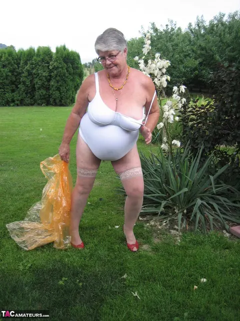 BBW in Stockings Strips Outdoors Showing Her Saggy Tits – photo 16 of 20