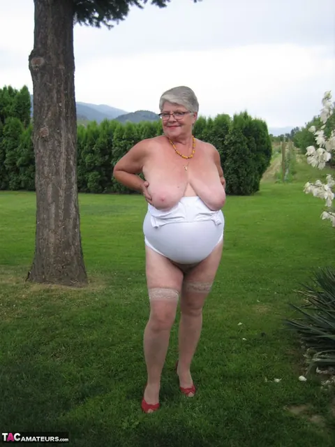 BBW in Stockings Strips Outdoors Showing Her Saggy Tits – photo 17 of 20