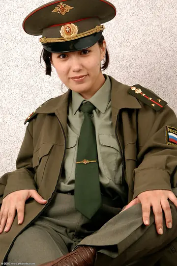Korean Woman Strips Off Her Military Uniform for Cosplay