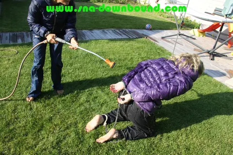 Thick Blonde in Pigtails Bound and Soaked on the Garden Lawn – photo 9 of 16