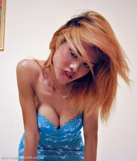 Redhead Thai Trans Woman Reveals Her Big Tits in a Dress – photo 7 of 17