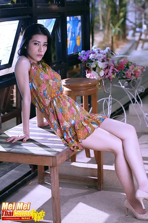 Busty Thai Woman Strips Out of Her Skirt on the Coffee Table – photo 1 of 16