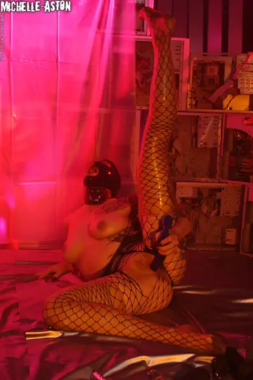 Tall Brunette MILF in Latex Hood Fingers and Toys Her Pussy
