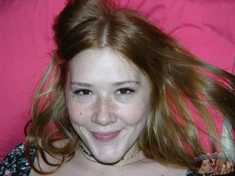 Redhead Spreads Her Trimmed Pussy on the Bed – photo 1 of 16