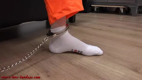 Brunette in Pigtails Spreads Her Legs While Cuffed in an Orange Jumper – photo 14 of 16