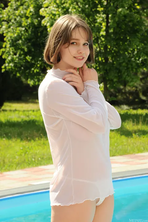Aurelia Lu: Ukrainian Brunette Strips Off Her Sheer Top by the Pool – photo 2 of 20