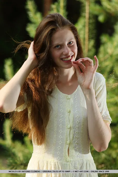 Pale Redhead Undresses Among Saplings Outdoors – photo 5 of 18