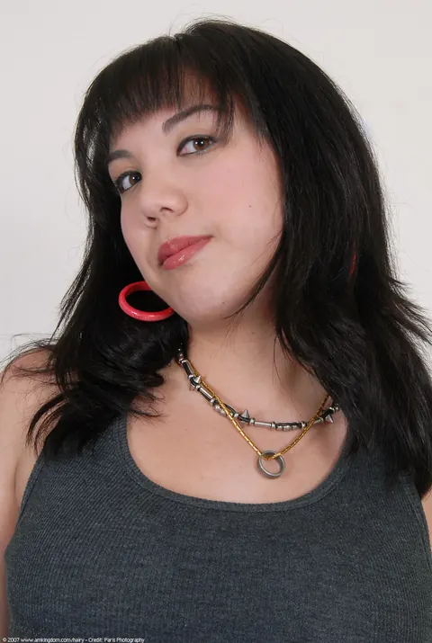 Woman Undresses and Poses Nude in a Full Set – photo 1 of 21