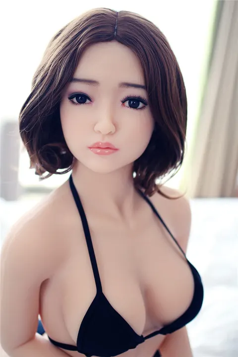 Brunette Slips Out of Her Clothes and Poses Nude for the Camera – photo 7 of 21