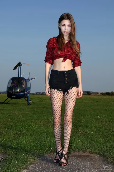 Mila Azul: Slim Brunette with Big Tits Spreads in Fishnet Pantyhose Outdoors – photo 1 of 16
