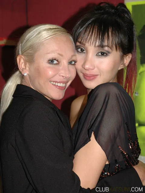 Katsuni: Busty Asian MILF and Blonde Dancer Strip for a Group of Men – photo 15 of 15