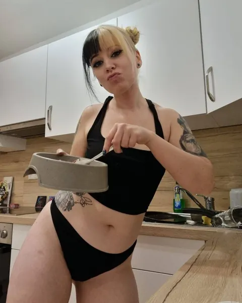 Tattooed Amateur Poses in Panties While Cooking in the Kitchen – photo 5 of 17