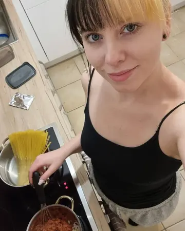 Tattooed Amateur Poses in Panties While Cooking in the Kitchen
