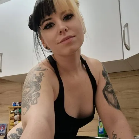 Tattooed Amateur Poses in Panties While Cooking in the Kitchen – photo 6 of 17