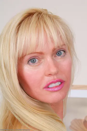 Tall Blonde MILF Strips Out of Her Sheer Lingerie to Show Her Big Tits